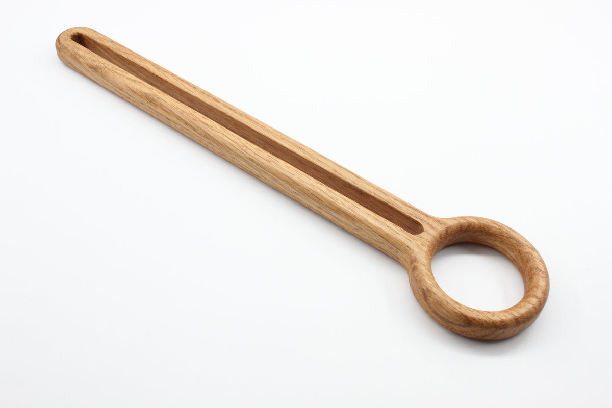 Wooden Danish dough whisk showing open mixing head