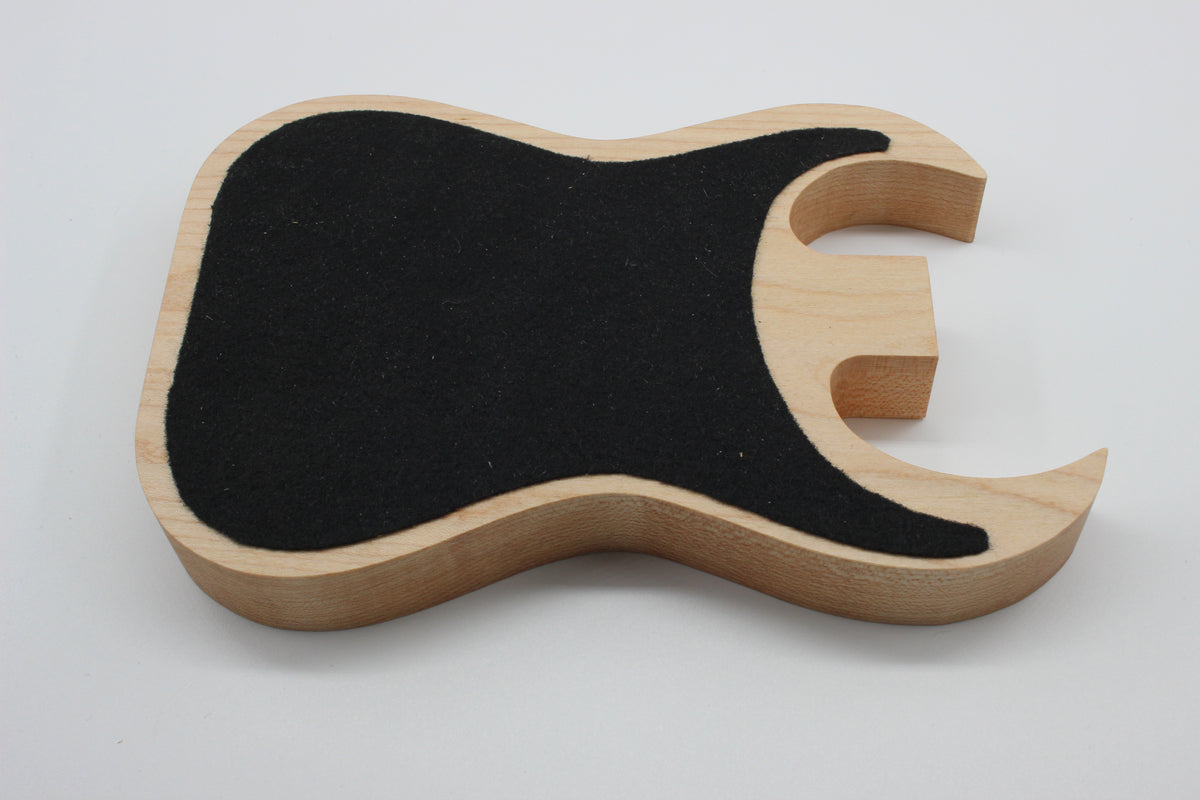 Underside of maple guitar valet tray with protective felt base