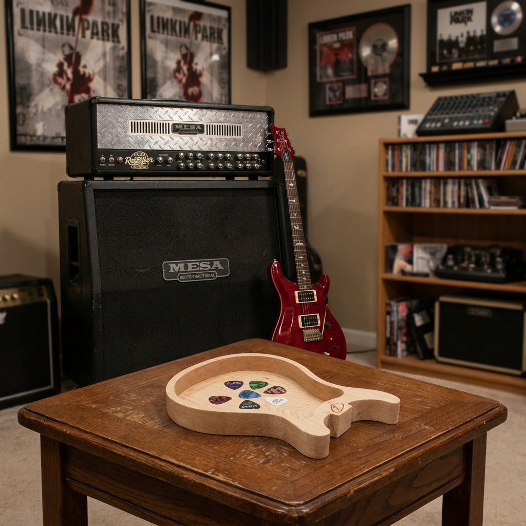 Maple guitar valet tray with plectrums in music room setting