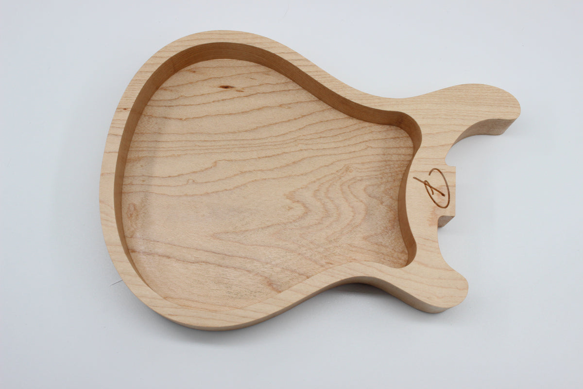 Maple guitar valet tray showing carved storage area and natural grain