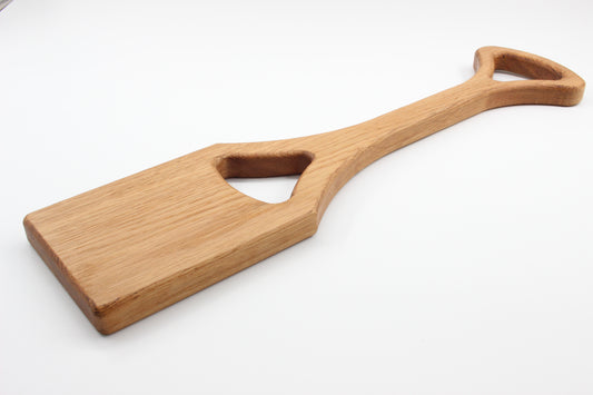 Solid oak BBQ grill scraper showing handle and scraping edge