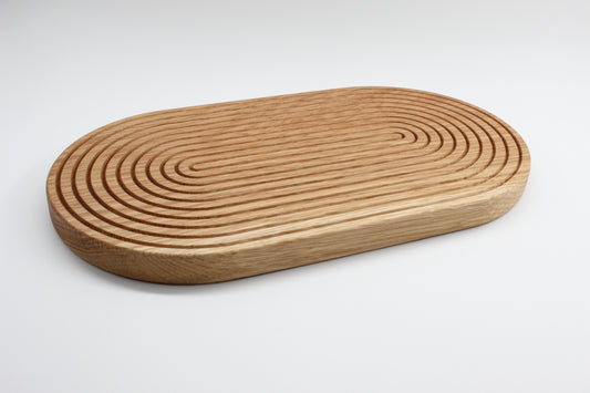 Handcrafted solid oak grooved trivet