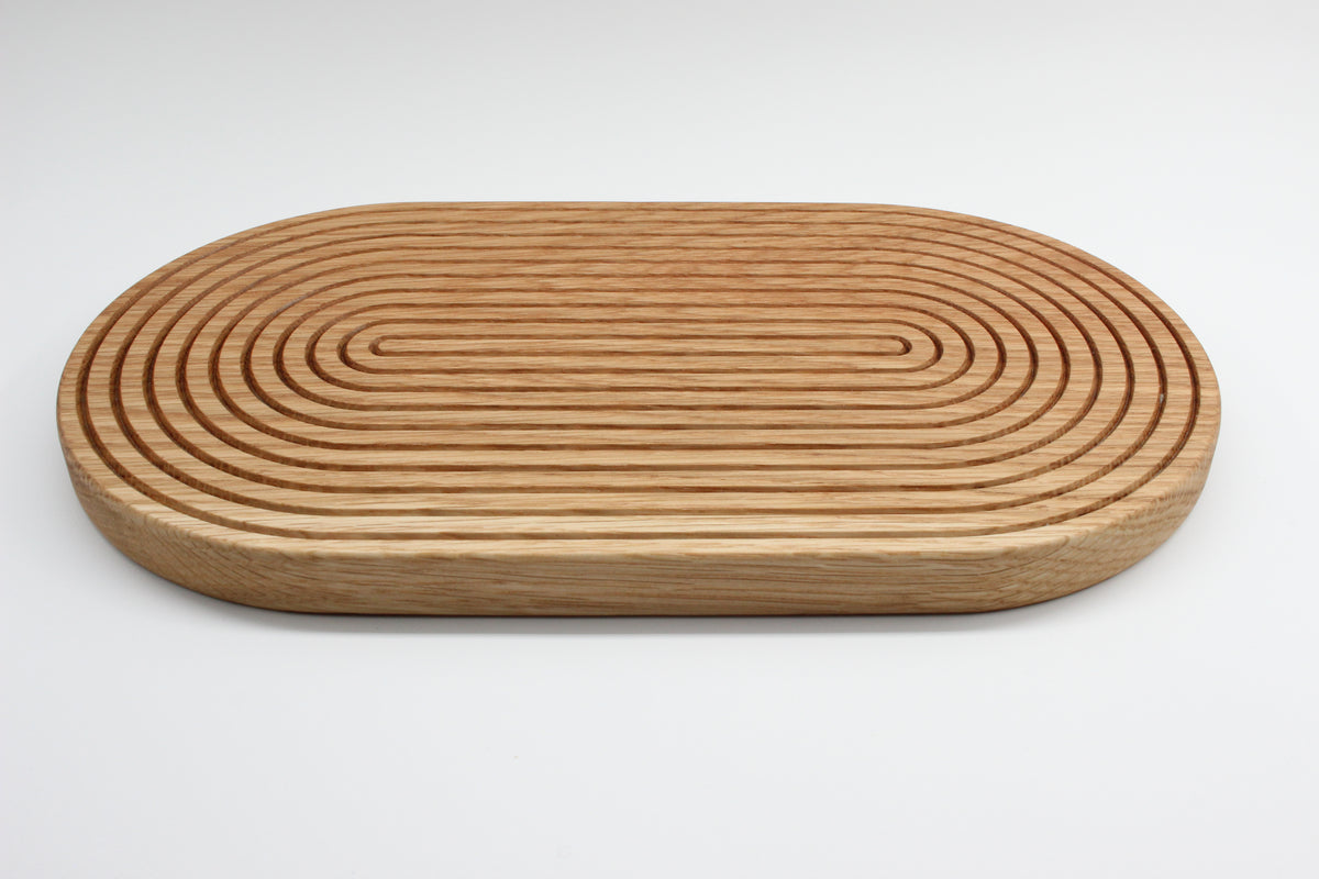 Grooved oak hot pan stand viewed from the side